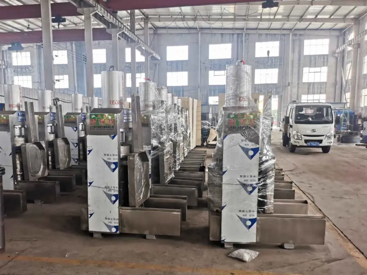 Packaged presses lined up for loading with a truck behind